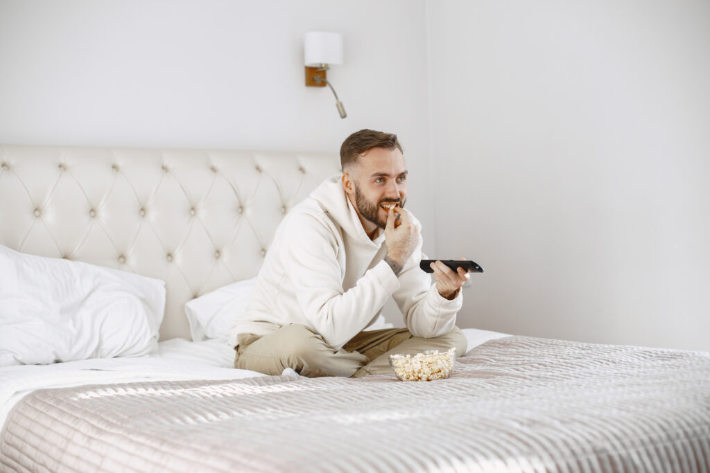 man watching screen casting in hotels